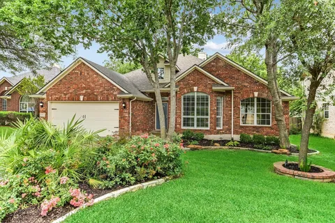Manicured Texas residential lawn with crisp mowing stripes